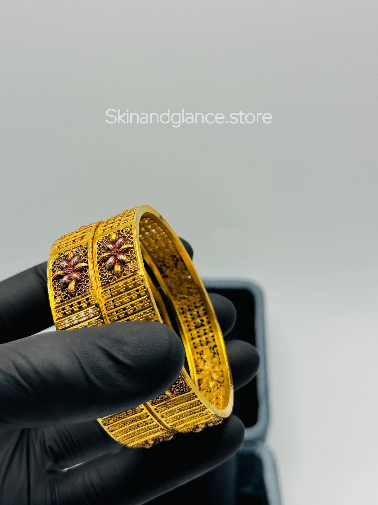 A Set of 2 Elegant 24K Gold-Plated Floral Bangles,