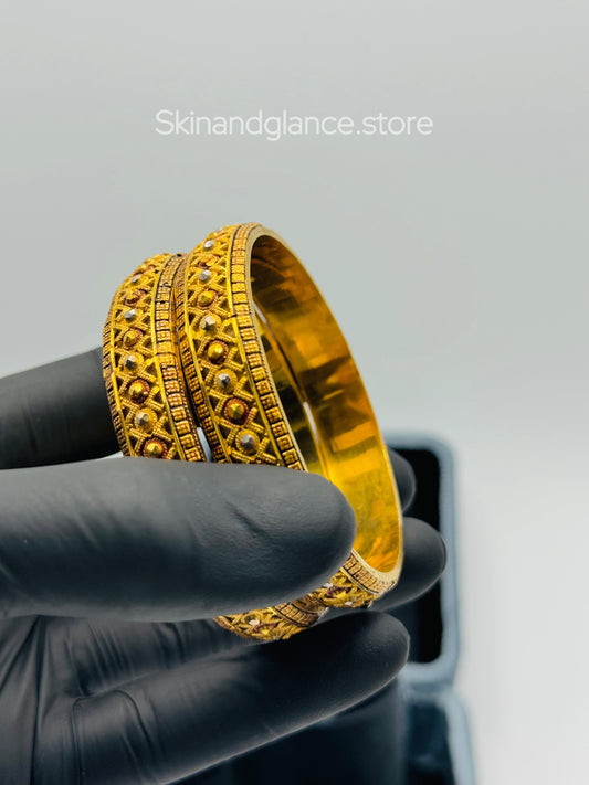 A set of 2 Elegant 24K Gold-Plated Floral Unique design Bangles,
