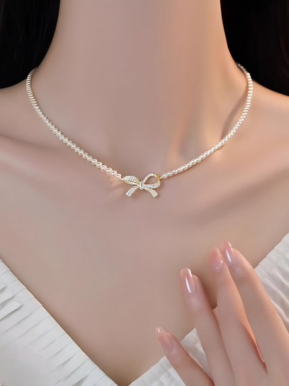 Pqt-992 – Bow Shape Pearl Pendant Necklace For Women – Dainty Jewelry With Sparkling Bow Design | Available In Silver & Golden Finish | Perfect Gift For Weddings, Parties & Everyday Glamour
